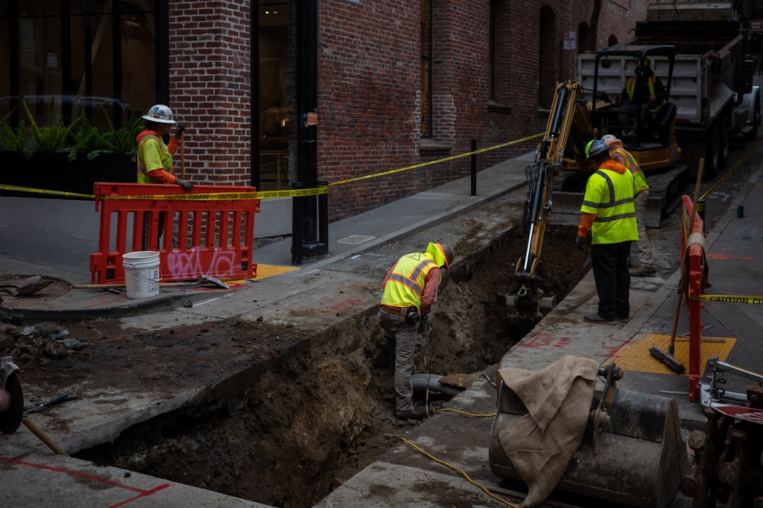 Street view showing municipal water main location, meter box placement, and trench route to a new house
