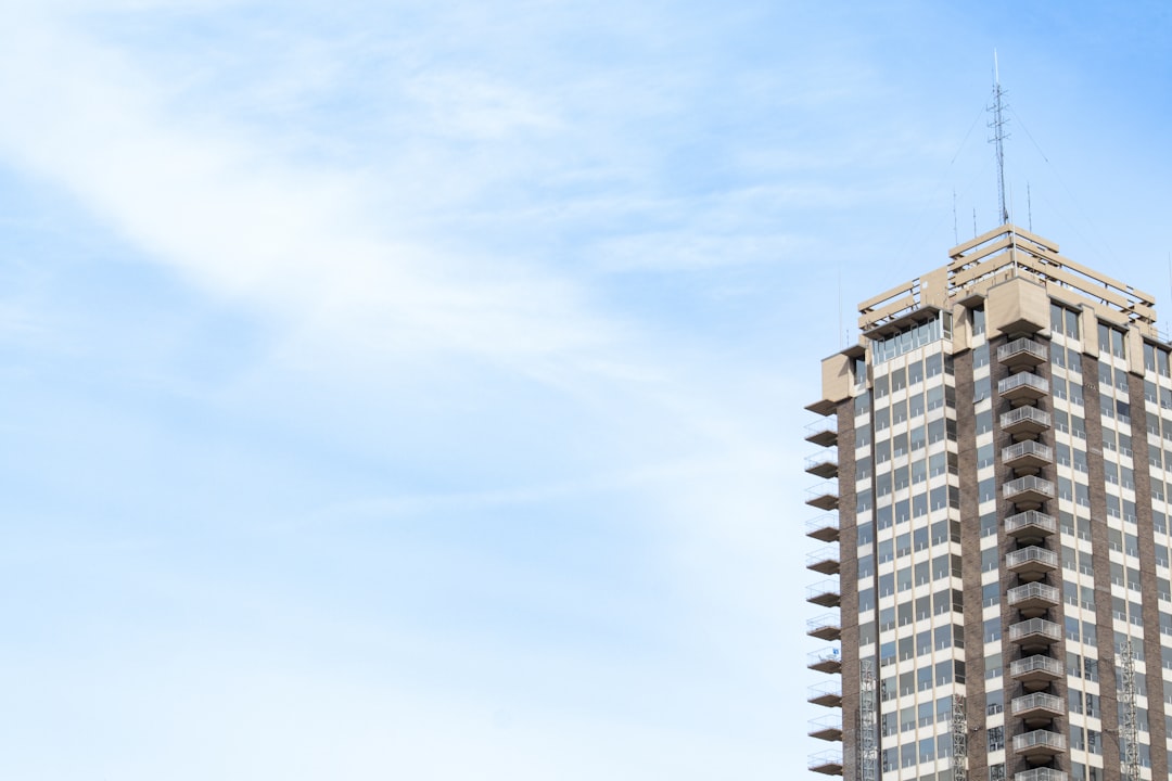 Photo of a building department counter with permit forms and plan sets