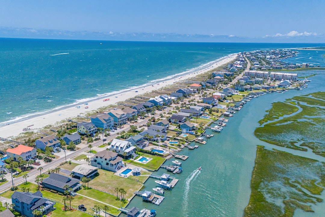 Bar chart comparing 2026 per-square-foot build cost ranges across South Carolina regions like Upstate, Midlands, and Lowcountry